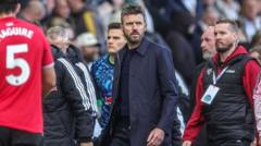 Michael Carrick Seeks Defensive Fix Ahead of Champions League Clash