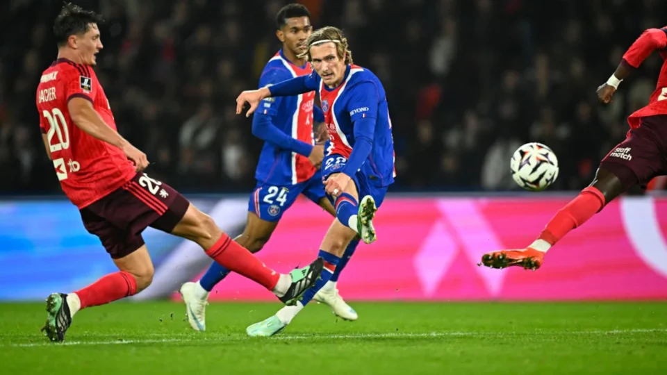 Mika Godts Inspires PSG to Ligue 1 Summit with Victory Over Lyon — Photo: AFP